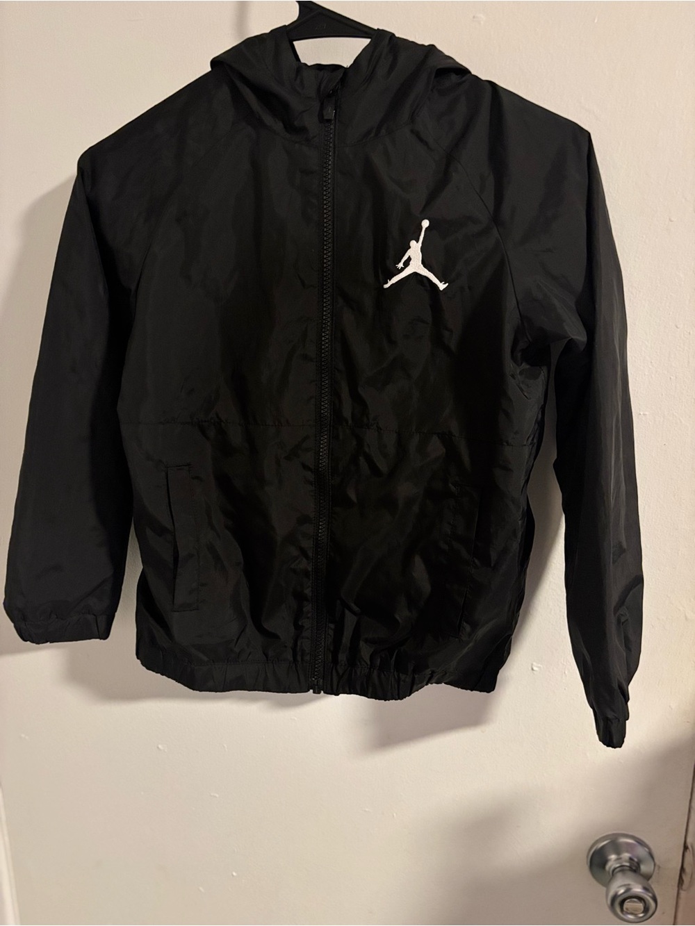 Jordan Black Hooded Rain Jacket with White Jumpman Logo
(1316)